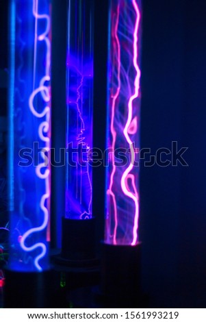 lightning in glass lamps powered by electric coil, electro glitch abstract blurred background