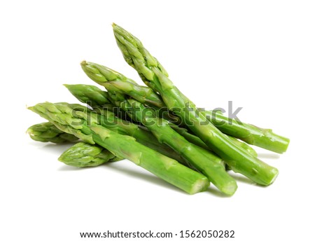 Effective Boiled asparagus on white background Royalty-Free Stock Photo #1562050282