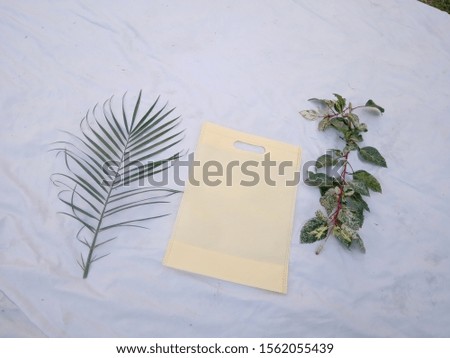 yellow color Non Woven ECO Friendly Bag with Green Plant Leaves