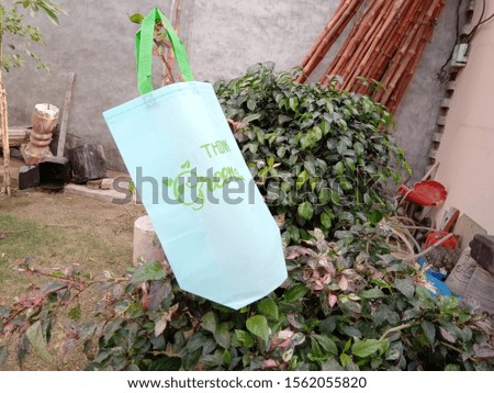 Non Woven ECO Friendly think green  Bag with Green Plant Leaves