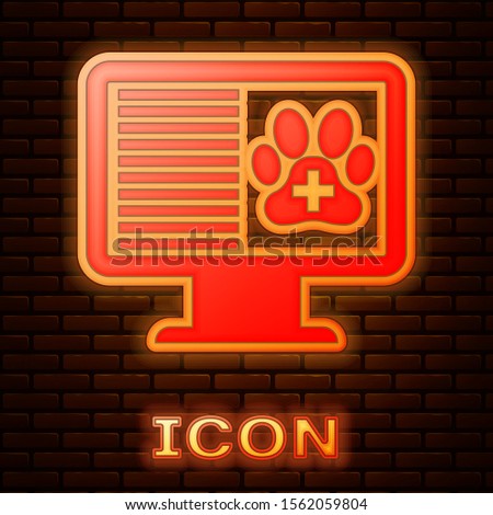 Glowing neon Medical clinical record pet on monitor icon isolated on brick wall background. Health insurance form. Prescription, medical check marks report.  Vector Illustration