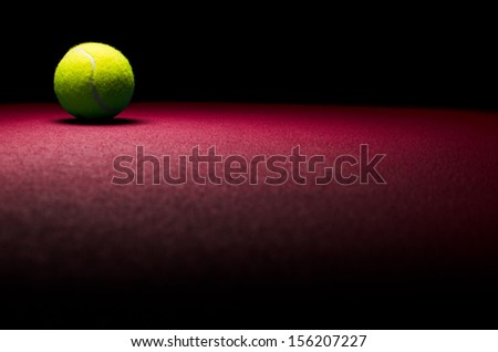 Tennis background - low key ball in corner with red surface