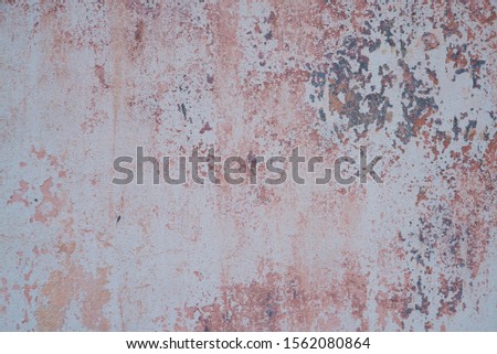 .background an old wall with colored spots and stains.
