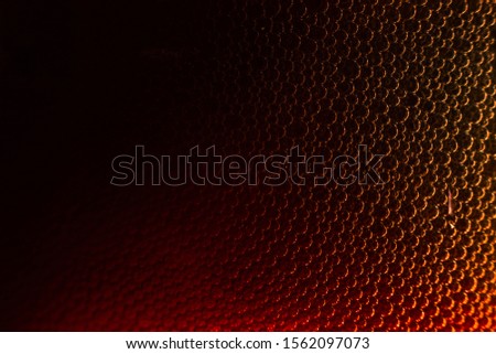 Drops of water on red metallic surface. Macro photo ,close up drop water on red background