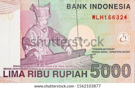 Woman portrait on Indonesia 1000 rupiah bank note, former currency of Indonesia