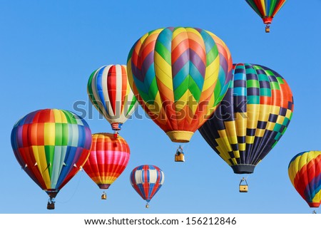 colorful hot air balloons against blue sky Royalty-Free Stock Photo #156212846