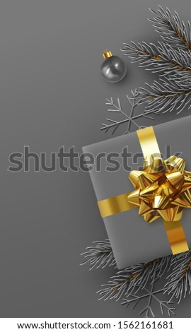 Christmas background. Xmas design realistic gift boxes with golden lush bow, pine branches, fir spruce branch, decorative balls. 3d dark gray snowflake. Flat lay, top view. New year's composition