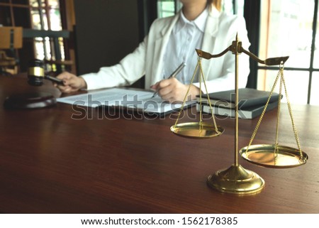 Lawyer working on the table in office. consultant lawyer, attorney, court judge, concept.