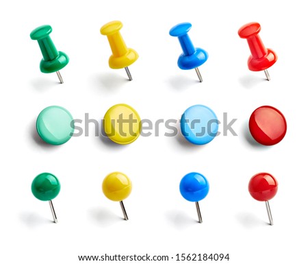 close up of push pin paperclip on white background Royalty-Free Stock Photo #1562184094