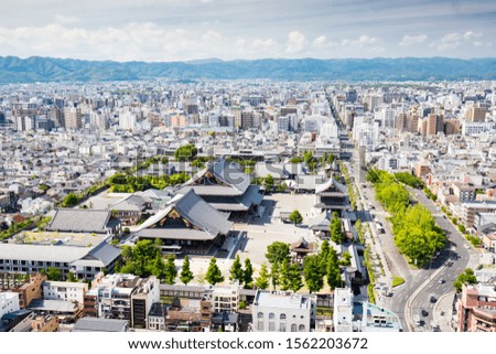 The view from Kyoto Tower on a clear spring day from the Kyoto downtown area in Japan Royalty-Free Stock Photo #1562203672