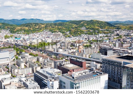 The view from Kyoto Tower on a clear spring day from the Kyoto downtown area in Japan Royalty-Free Stock Photo #1562203678