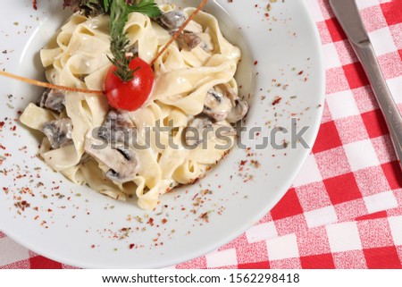 Turkish style pastas made by pouring sauce on a super spaghettive pasta mixture and making it more delicious and colorful