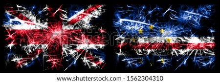 Great Britain, United Kingdom vs Cape Verde New Year celebration travel sparkling fireworks flags concept background. Combination of two abstract states flags.
