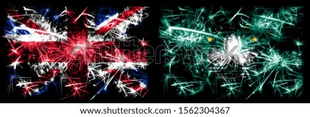 Great Britain, United Kingdom vs Macau, China New Year celebration travel sparkling fireworks flags concept background. Combination of two abstract states flags.
