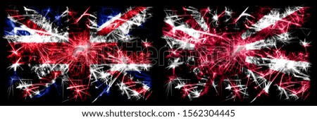 Great Britain, United Kingdom vs Japan, Japanese, sun New Year celebration travel sparkling fireworks flags concept background. Combination of two abstract states flags.
