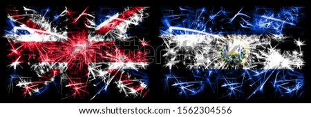 Great Britain, United Kingdom vs El Salvador, Salvadorian New Year celebration travel sparkling fireworks flags concept background. Combination of two abstract states flags.
