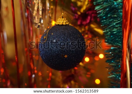Photos of beautiful Christmas toys. Shooting subjects close-up. Christmas toys on the Christmas tree.
