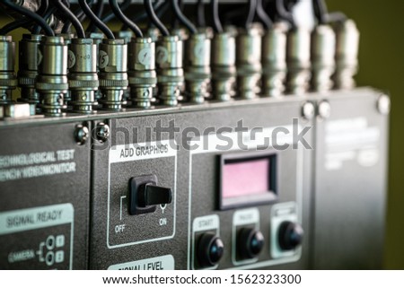 Closeup green panel of television equipment at a telecentre. Motion picture and television production concept. Studio Concept