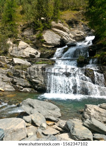 Lillaz Waterfalls, Cogne, Aosta Valley, Italy Royalty-Free Stock Photo #1562347102