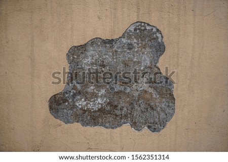 Wall of an old log house. Clay and wood. Wooden slats. Old stucco. Grunge background and texture. Concept for design and interior.