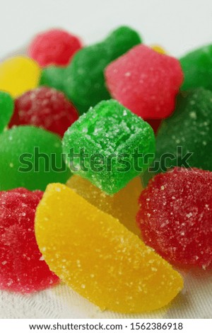 Vertical Image of Fruity Flavor Sugar Coated Jelly Soft Candies on White Background