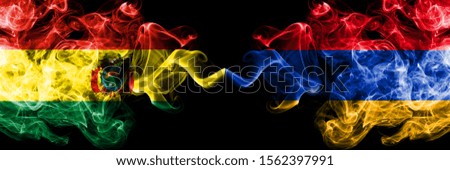 Bolivia, Bolivian vs Armenia, Armenian smoky mystic states flags placed side by side. Concept and idea thick colored silky abstract smoke flags