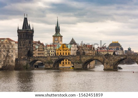 Castle of Prague and karl´s bridge. Typically view in Prague. Old memorials in the middle of europe. Royalty-Free Stock Photo #1562451859