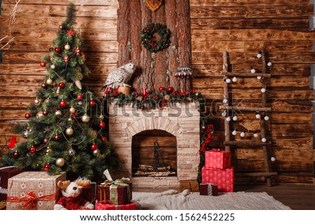 Beautiful New Year's interior, Christmas tree, fireplace, gifts