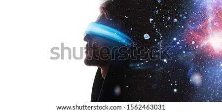 Double exposure of male face. Abstract man portrait. Digital art. Guy in glasses of virtual reality. Augmented reality, dream, future technology, game concept. VR.