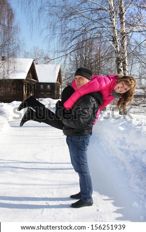 Young loving couple on appointment on the nature, winter season