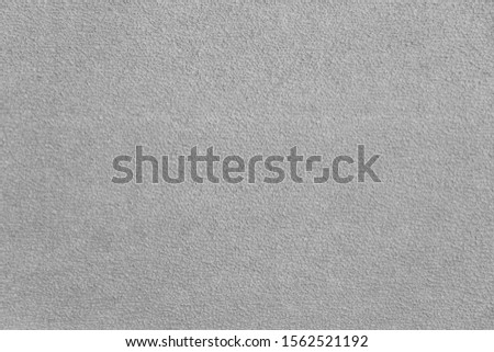 White wall with relief stucco. Gray texture background from natural concrete or plaster. Glue base on wooden veneer. Hot glue.