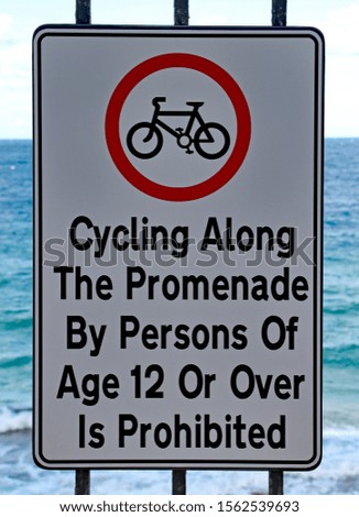 Sign on the promenade in Sliema in Malta prohibiting cyclists of age 12 or over