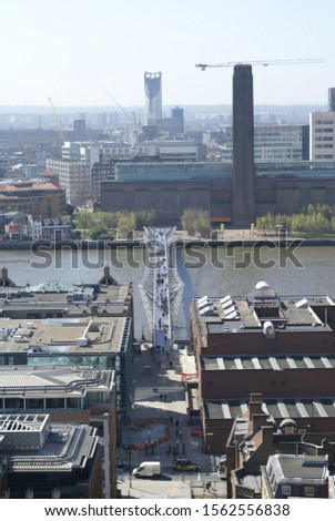 London, UK: panoramic view of the city from the Golden Gallery of St. Paul's Cathedral, with the Millennium Bridge in the background