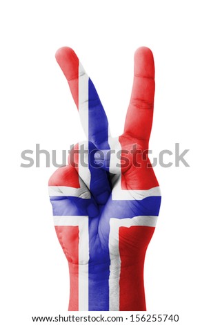 Hand making the V sign, Norway flag painted as symbol of victory, win, success - isolated on white background
