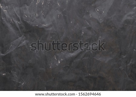 dark polyethylene texture with bruises and dust
