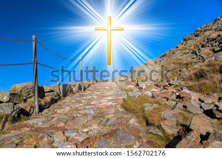 Glowing cross . Christian cross against the sky