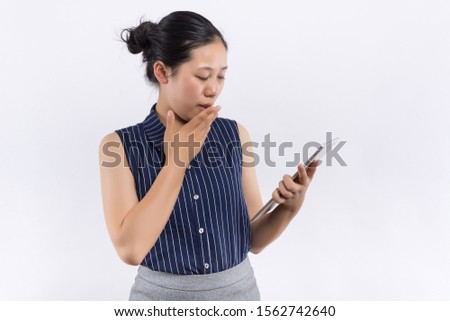 Businesswoman holding tablet in hands isolated