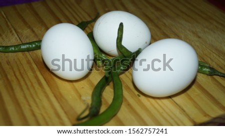 A beautiful picture of egg with chillies