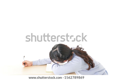 Young student skip studying on desk