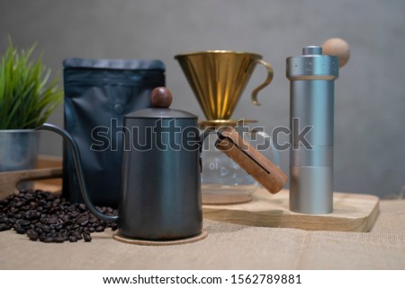 Round coffee beans to make drip coffee and accessories.