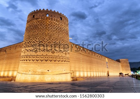 Gorgeous evening view of the Karim Khan Citadel (Arg-e-Karim Khan) in Shiraz, Iran. Amazing Iranian architecture. The fortress is a popular tourist attraction of the Middle East. Royalty-Free Stock Photo #1562800303