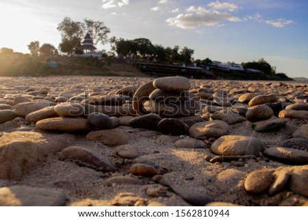 16 November 2019: Pictures of the rocks in the Mekong River arranged in a beautiful setting at dusk, a popular tourist destination in Loei province.