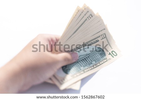 Person holding
Cash in the hand with a white background