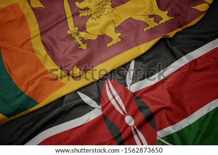 waving colorful flag of kenya and national flag of sri lanka. macro