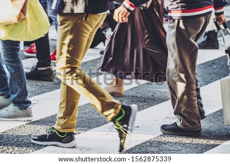 People walking crosswalk at Umeda in Japan