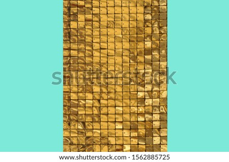 The combination of abstract golden mosaic background and trendy blue studio background.