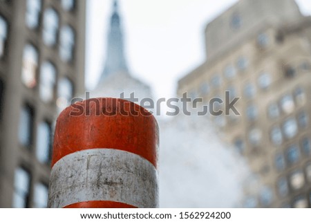 New York City, Buildings and Steam venting from the street, utility pipe hot steam to building for heating.
