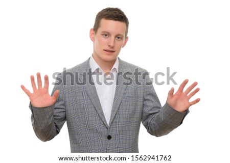 Concept of a young manager man talking to the camera. Photo isolate Portrait of a secretary guy on a white background in a gray business suit in different poses.