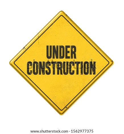 Yellow sign on a white background - Under construction