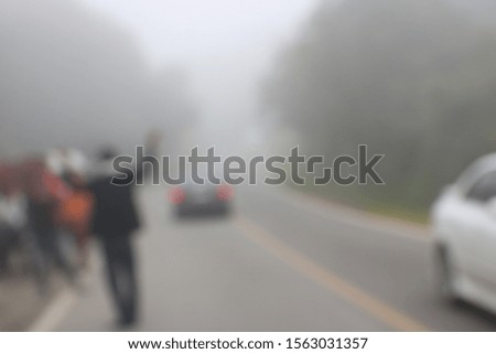 Picture of tourists traveling on Doi Inthanon, background blur.  